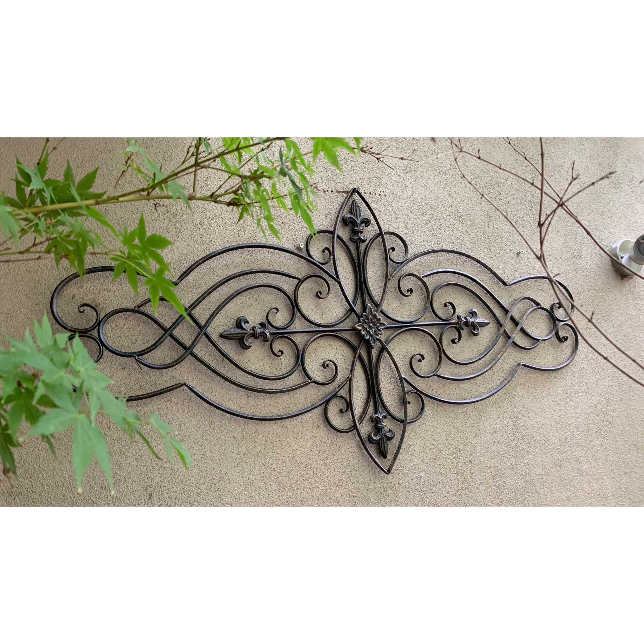 Wall Art, Abstract Metal Decorative - Antique Brown in the garden on a wall