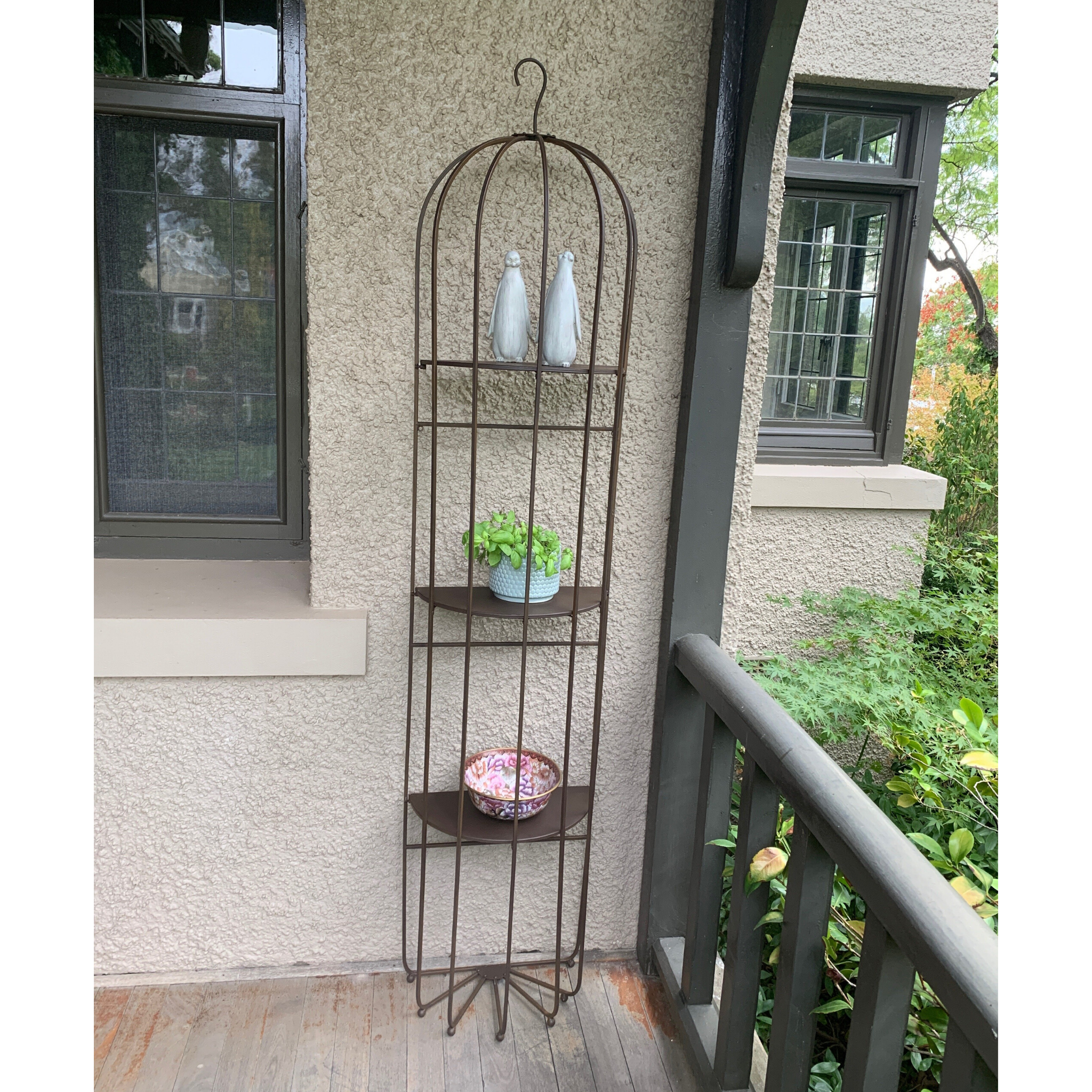 Wall Metal Hanging Decorative Display Shelf on a patio
