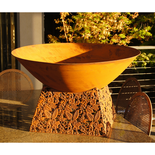 rusty metal fire bowl with laser cut base