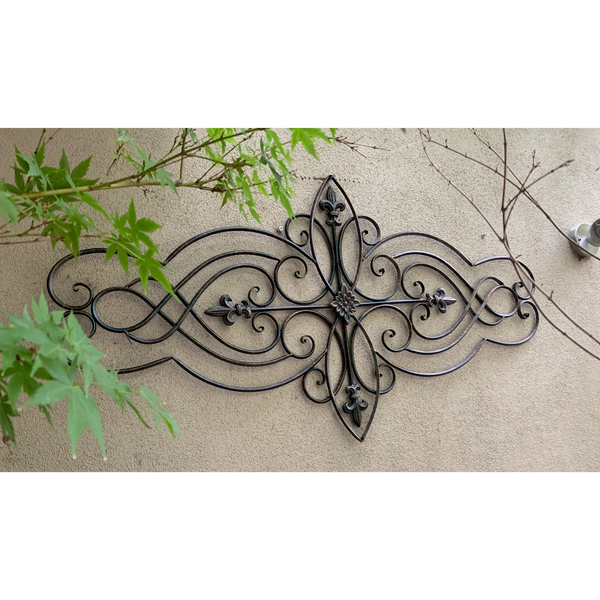 Wall Art, Abstract Metal Decorative - Antique Brown  in the garden on a wall 