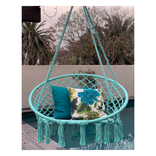 Macrame Hanging chair. Made from woven spearmint coloured cotton,