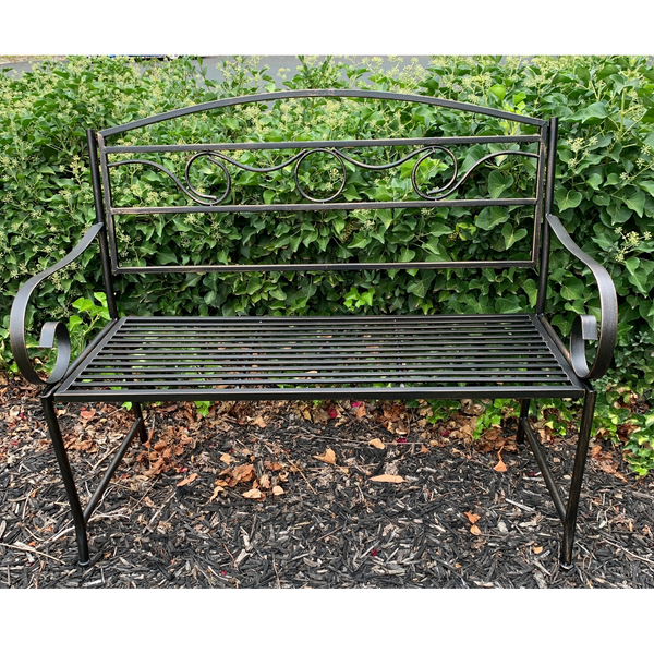 Outdoor Eden garden bench, bronze/black coloured metal, set in a garden