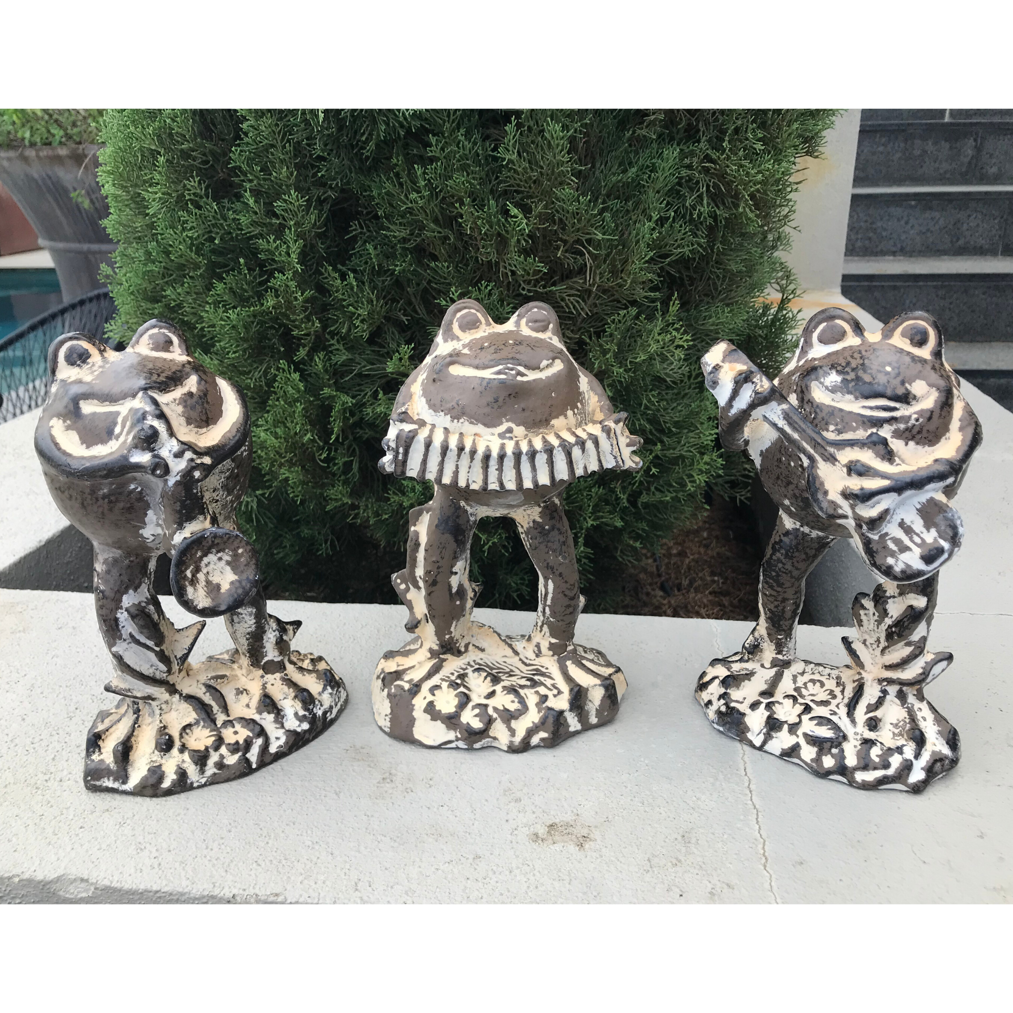 Statue - Frog Playing Guitar in the garden with 2 other frogs playing the accordion and the trumpet