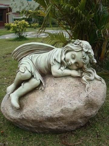 Statue - Fairy Resting on Rock in the garden