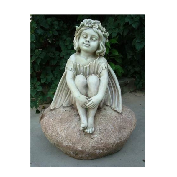 Statue - Fairy Sitting on a Rock in the garden