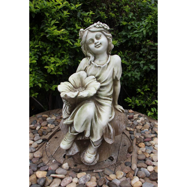 Statue - Fairy on Mushroom Bird Feeder in the garden