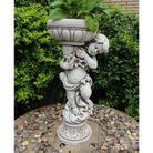 Statue - Boy Flower Pot Plant in the garden