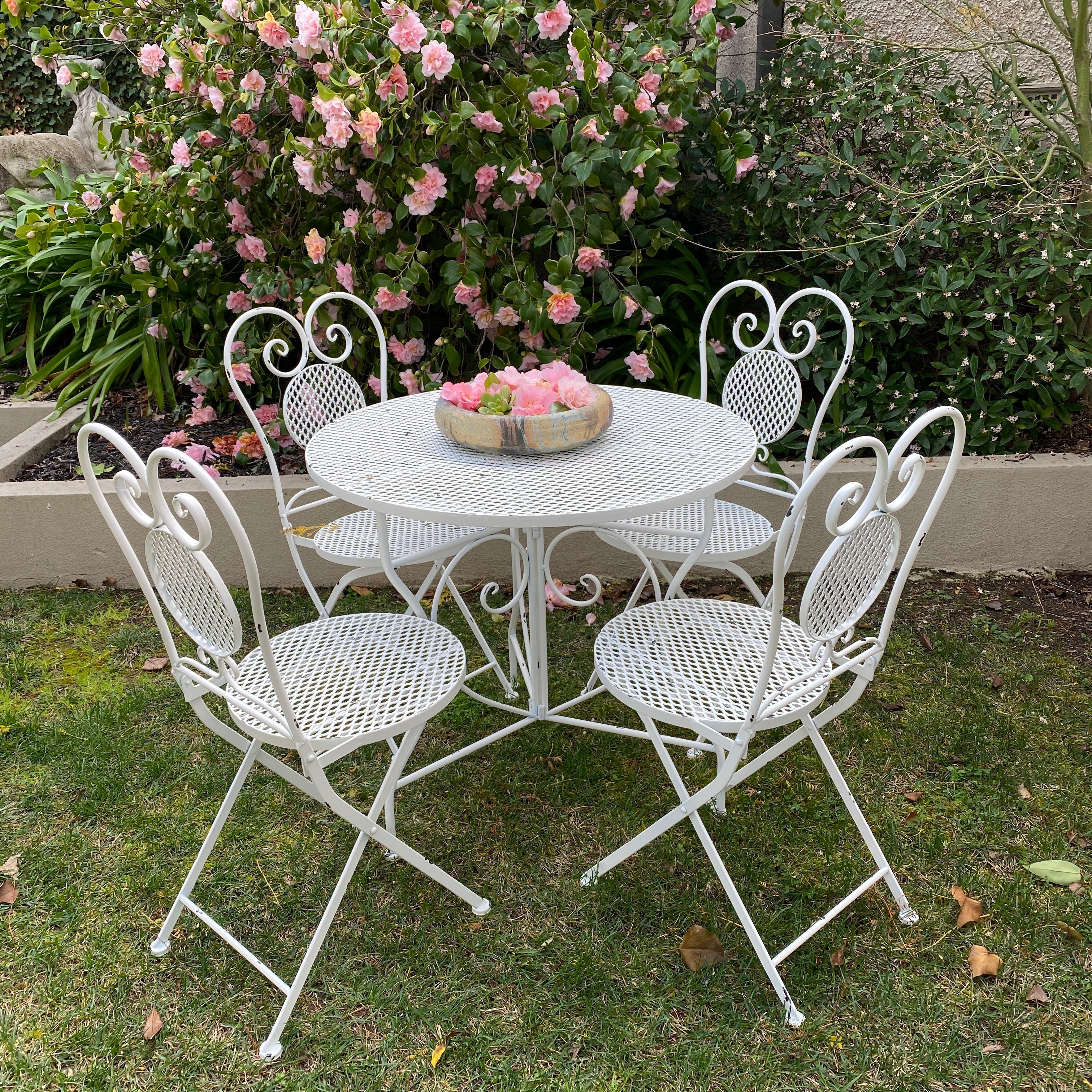 cream metal garden table and chairs
