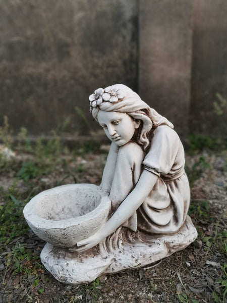 Statue Girl Sitting Holding Bird Feeder